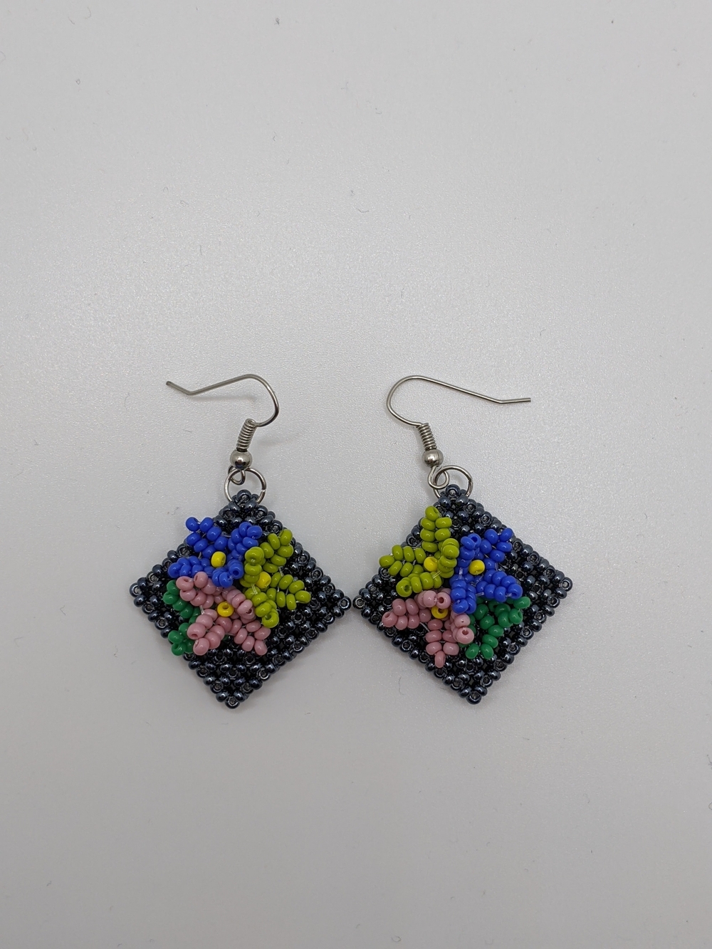 Handmade Beaded Floral Drop Earrings in Black with Pink, Blue & Green Accents